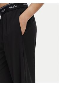 Guess Spodnie dresowe V6GB08 W1771 Czarny Relaxed Fit. Kolor: czarny. Materiał: syntetyk #2