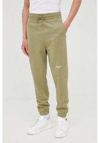 Calvin Klein Jeans spodnie bawełniane męskie kolor zielony gładkie. Kolor: zielony. Materiał: bawełna. Wzór: gładki