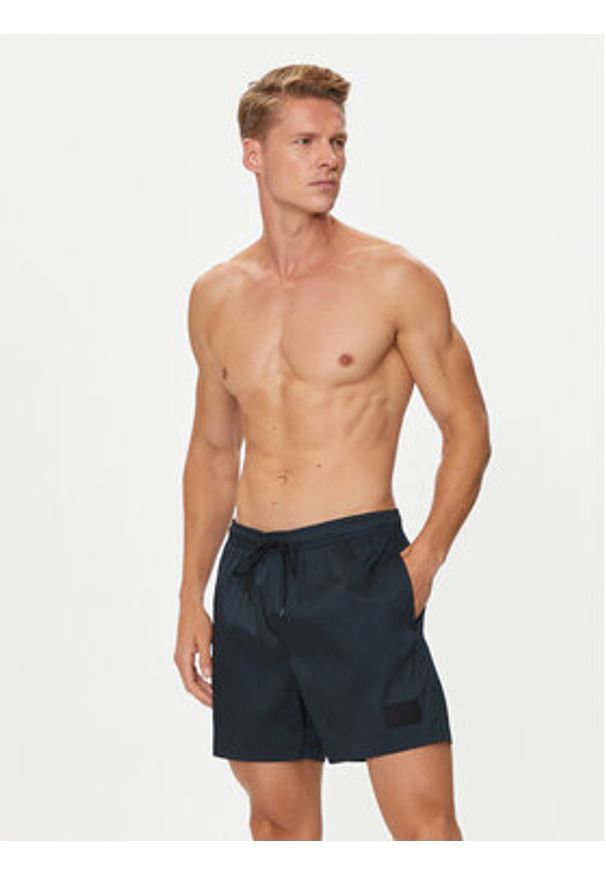 Calvin Klein Swimwear Szorty kąpielowe KM0KM01023 Czarny Regular Fit. Kolor: czarny. Materiał: syntetyk