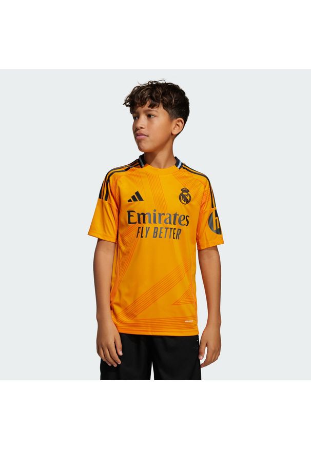 Adidas - Koszulka Real Madrid 24/25 Away Kids. Kolor: pomarańczowy. Materiał: materiał