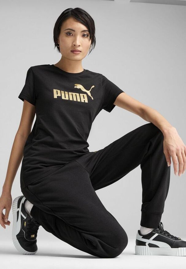 Puma - Damska koszulka z logo NO. 1 ESS METALLIC PUMA Black Metallic Gold. Kolor: czarny. Wzór: nadruk