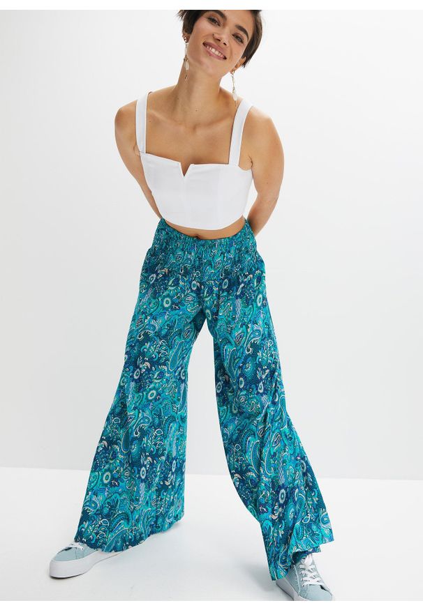 bonprix - Spodnie palazzo z lejącej wiskozy. Kolor: zielony. Materiał: wiskoza. Wzór: nadruk. Sezon: lato