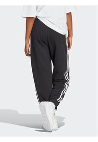 Adidas - adidas Spodnie dresowe Essentials 3-Stripes French Terry Loose-Fit Joggers HA4375 Czarny Loose Fit. Kolor: czarny. Materiał: bawełna #2