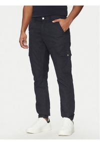 Guess Spodnie materiałowe M5RB54 WGXY1 Granatowy Slim Fit. Kolor: niebieski. Materiał: bawełna #1
