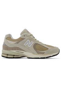 Buty unisex New Balance U2002RB – beżowe. Kolor: beżowy. Materiał: guma, zamsz. Szerokość cholewki: normalna