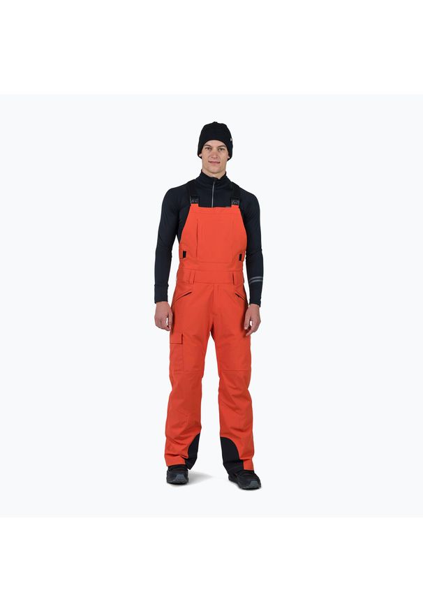 Spodnie narciarskie męskie Rossignol Relax Bib. Kolor: pomarańczowy. Sezon: zima. Sport: narciarstwo