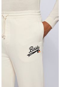 BOSS - Boss Spodnie 50463564 męskie kolor kremowy gładkie. Kolor: beżowy. Wzór: gładki #3