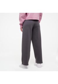 Spodnie dresowe damskie Puma Gym & Pilates. Kolor: czarny. Materiał: dresówka. Sport: joga i pilates