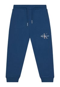 Calvin Klein Jeans Spodnie dresowe Monogram Logo IU0IU00285 M Niebieski Regular Fit. Kolor: niebieski. Materiał: bawełna