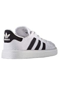 Buty Adidas Originals Superstar Jr BB2970 białe. Okazja: na co dzień. Zapięcie: pasek. Kolor: biały. Materiał: guma, syntetyk, materiał. Szerokość cholewki: normalna. Model: Adidas Superstar #7