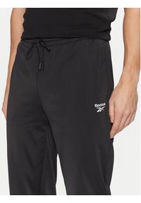 Reebok Spodnie dresowe Vector 100063237 Czarny Regular Fit. Kolor: czarny. Materiał: syntetyk #3