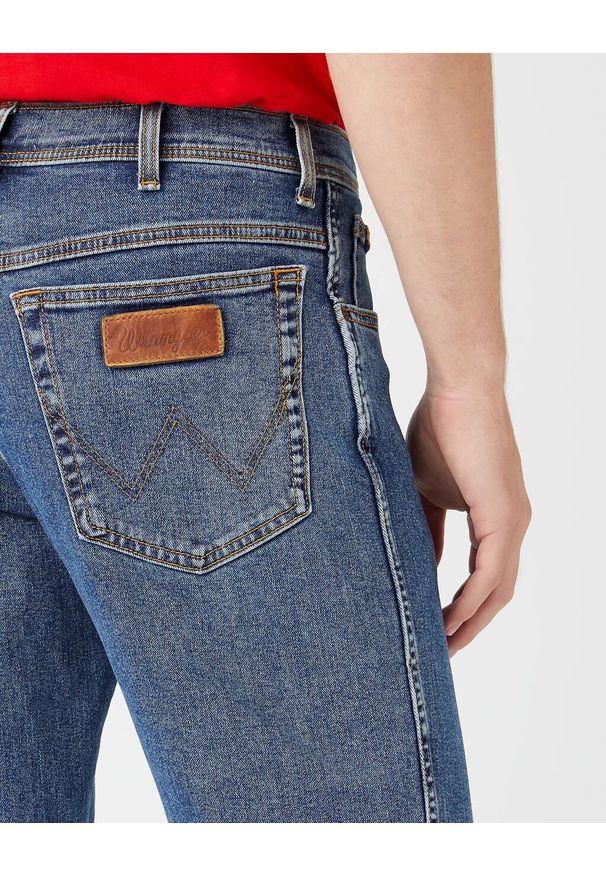 Wrangler - WRANGLER TEXAS STONEWASH W12133010 112126054. Stan: podwyższony. Styl: klasyczny