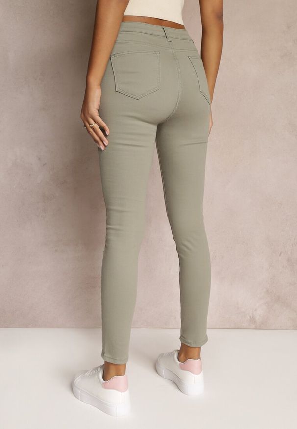 Renee - Ciemnozielone Spodnie Skinny Winvienne. Stan: podwyższony. Kolor: zielony. Długość: długie. Wzór: ażurowy