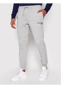 Spodnie dresowe New Balance. Kolor: szary. Materiał: dresówka, syntetyk #1