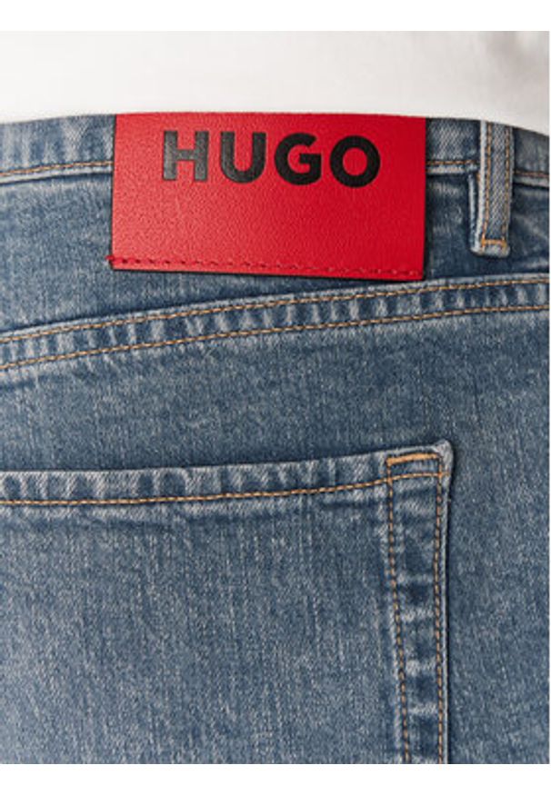 Hugo - HUGO Jeansy 50537705 Niebieski Tapered Fit. Kolor: niebieski