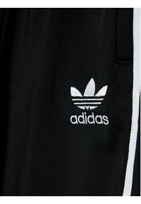 Adidas - adidas Spodnie dresowe Sst Track GN8453 Czarny Regular Fit. Kolor: czarny. Materiał: syntetyk #2