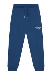Calvin Klein Jeans Spodnie dresowe Monogram Logo IU0IU00285 D Niebieski Regular Fit. Kolor: niebieski. Materiał: bawełna
