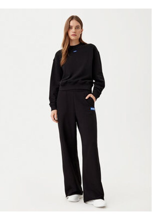 Hugo - HUGO Spodnie dresowe 50522435 Czarny Relaxed Fit. Kolor: czarny. Materiał: bawełna