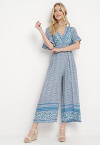 Born2be - Niebieski Bawełniany Kombinezon z Gumkami w Pasie i Kopertowym Dekoltem Zapinany z Tyłu na Guziki Lorrania. Okazja: na co dzień. Kolor: niebieski. Materiał: bawełna. Długość rękawa: krótki rękaw. Długość: krótkie. Styl: wizytowy, casual, elegancki #7