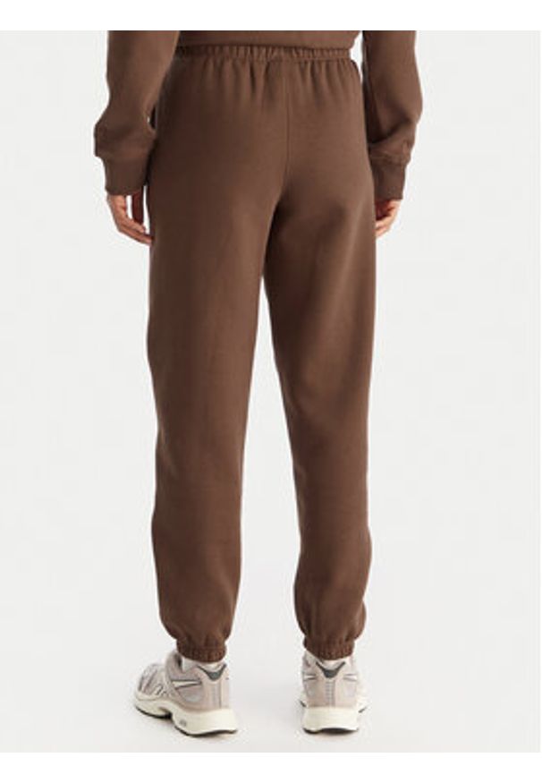 Reebok Spodnie dresowe Reebok X Ewa Chodakowska Evren RK25308CCW Brązowy Regular Fit. Kolor: brązowy. Materiał: syntetyk, bawełna