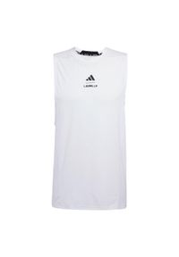Adidas - Koszulka Les Mills Graphic Tank. Kolor: biały. Długość rękawa: bez rękawów. Technologia: ClimaCool (Adidas). Sport: fitness