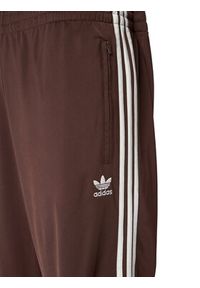 Adidas - adidas Spodnie dresowe adicolor Classics Firebird KA0482 Brązowy Regular Fit. Kolor: brązowy. Materiał: syntetyk #4