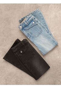 Reserved - Jeansy flare - czarny. Kolor: czarny