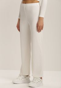 Renee - Białe Spodnie Szerokie Salanome. Stan: podwyższony. Kolor: biały. Materiał: guma, dzianina. Wzór: ażurowy, prążki #3