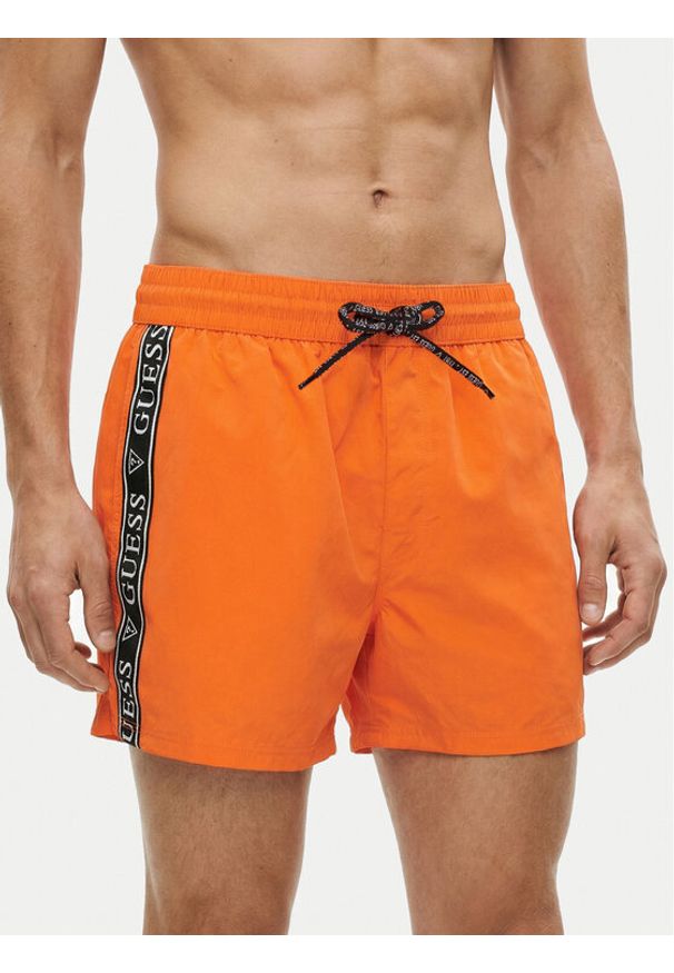 Guess Szorty kąpielowe F6GT00 WN162 Pomarańczowy Regular Fit. Kolor: pomarańczowy. Materiał: syntetyk