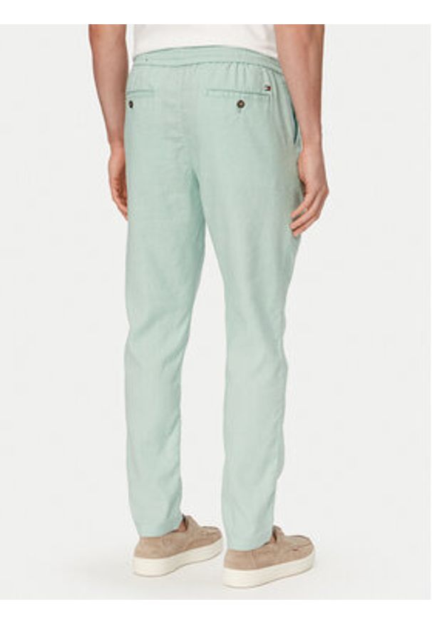 TOMMY HILFIGER - Tommy Hilfiger Chinosy Harlem MW0MW42336 Zielony jasny Regular Fit. Kolor: zielony. Materiał: len