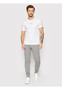 Calvin Klein Spodnie dresowe Small Logo K10K107954 Szary Regular Fit. Kolor: szary. Materiał: bawełna