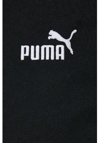 Puma bluza damska kolor czarny z kapturem z aplikacją. Typ kołnierza: kaptur. Kolor: czarny. Materiał: materiał. Długość rękawa: długi rękaw. Długość: długie. Wzór: aplikacja