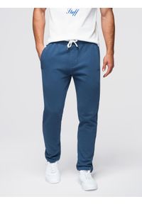 Ombre Clothing - Spodnie męskie dresowe z nogawką bez ściągacza - ciemnoniebieskie V4 - Rozmiar: L. Kolor: niebieski. Materiał: dresówka. Styl: sportowy