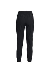 Spodnie sportowe damskie Under Armour Unstoppable Jogger. Kolor: wielokolorowy, czarny, szary. Materiał: dresówka