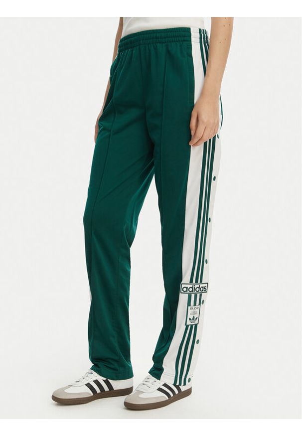 Adidas - adidas Spodnie dresowe Adibreak KD6327 Zielony Loose Fit. Kolor: zielony. Materiał: syntetyk