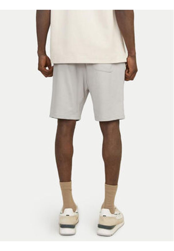 Jack & Jones - Jack&Jones Szorty sportowe Vesterbro 12252251 Beżowy Relaxed Fit. Kolor: beżowy. Materiał: syntetyk. Styl: sportowy