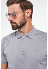 Emporio Armani - Polo męskie EMPORIO ARMANI. Typ kołnierza: polo