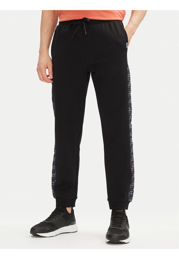 EA7 Emporio Armani Spodnie dresowe 7M000216 AF12660 UC001 Czarny Regular Fit. Kolor: czarny. Materiał: bawełna, syntetyk