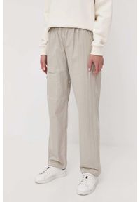 Rains spodnie 18700 Woven Pants Regular kolor zielony proste high waist. Stan: podwyższony. Kolor: zielony. Materiał: tkanina #5