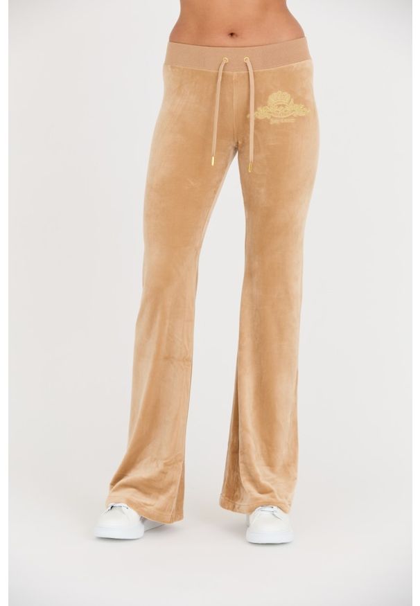 Juicy Couture - JUICY COUTURE Beżowe damskie spodnie Arched Metallic Layla, Rozmiar L. Kolor: beżowy