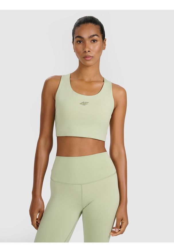 4f - 4F Biustonosz treningowy z niskim wsparciem - zielony XS. Kolor: zielony. Materiał: elastan, włókno, syntetyk, materiał, guma. Rodzaj stanika: wyciągane miseczki. Wzór: gładki, ze splotem. Sport: fitness, joga i pilates
