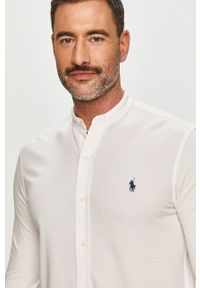 Polo Ralph Lauren - Koszula 710742468002. Typ kołnierza: polo. Kolor: biały. Materiał: tkanina. Długość rękawa: długi rękaw. Długość: długie. Wzór: gładki, aplikacja #1