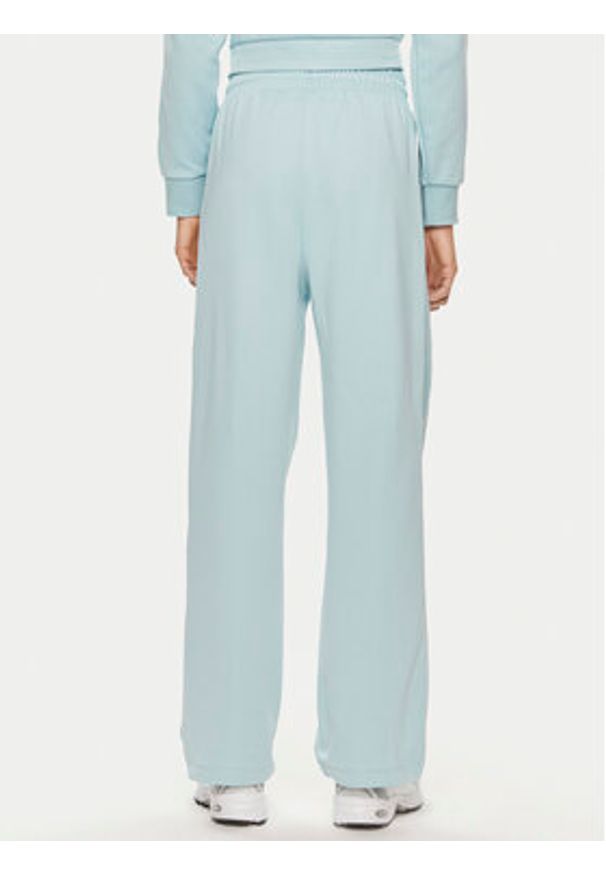 Puma Spodnie dresowe T7 624212 Niebieski Relaxed Fit. Kolor: niebieski. Materiał: bawełna, syntetyk