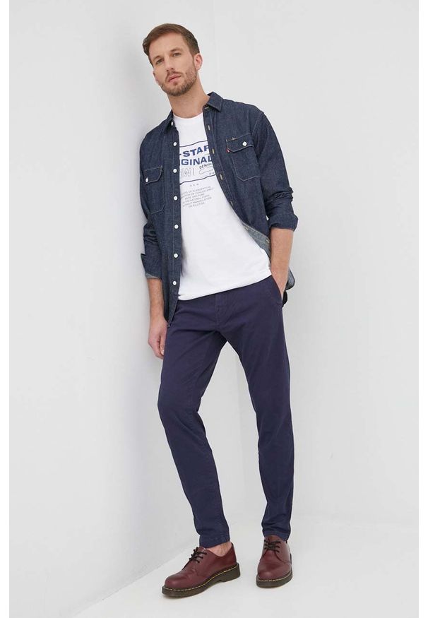 G-Star RAW - G-Star Raw spodnie męskie kolor granatowy w fasonie chinos. Kolor: niebieski. Materiał: tkanina