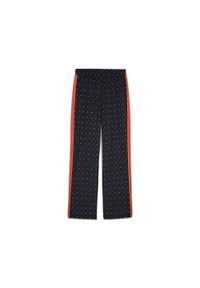 Puma - PUMA SPODNIE ROAD TO UNITY AOP STRAIGHT 62979416 r XL. Kolor: niebieski