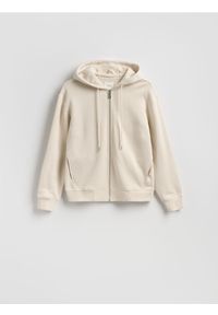 Reserved - Rozpinana bluza z kapturem - beżowy. Typ kołnierza: kaptur. Kolor: beżowy. Materiał: bawełna, dzianina #1