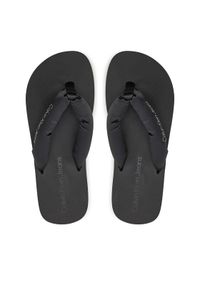 Calvin Klein Jeans Japonki Beach Sandal Flatform Padded Ny YW0YW01400 Czarny. Kolor: czarny. Materiał: materiał