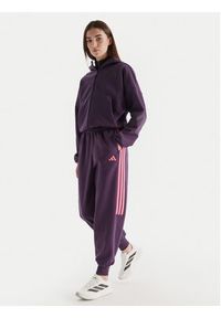 Adidas - adidas Spodnie dresowe Tiro 3-Stripes JM9072 Fioletowy Loose Fit. Kolor: fioletowy. Materiał: bawełna