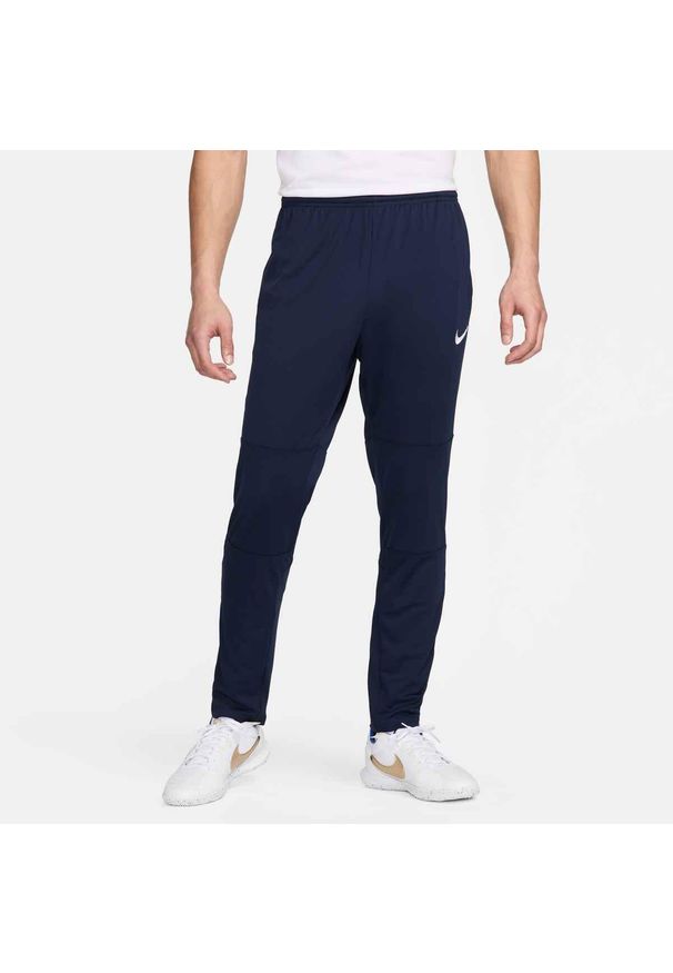 Nike - Spodnie sportowe męskie Dri-FIT Park 20 Knit Pants. Kolor: niebieski, wielokolorowy, biały. Materiał: poliester. Technologia: Dri-Fit (Nike). Sport: piłka nożna