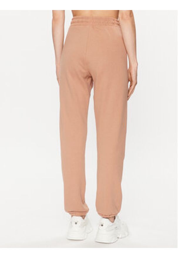 DKNY Sport Spodnie dresowe DP2P3114 Brązowy Regular Fit. Kolor: brązowy. Materiał: syntetyk, bawełna